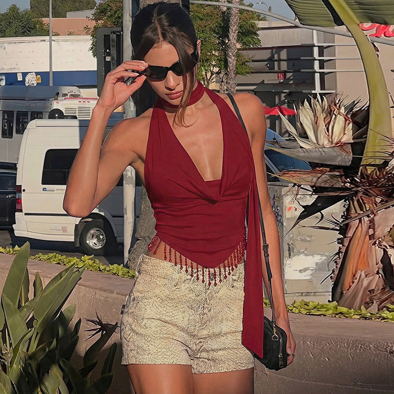 The Nyla Tassel-Detail Cutout Lace-Up Top